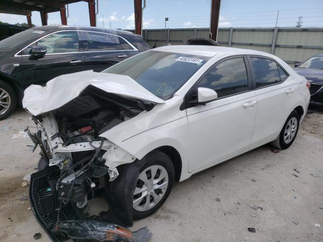 Photo 1 VIN: 5YFBURHEXKP858649 - TOYOTA COROLLA L 