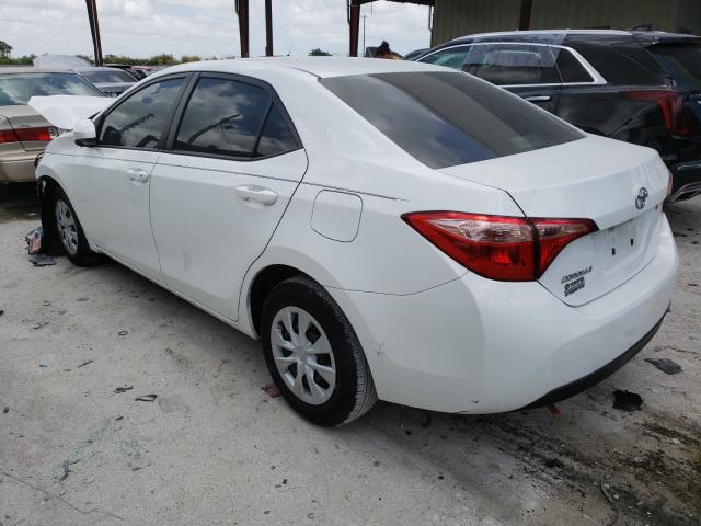 Photo 2 VIN: 5YFBURHEXKP858649 - TOYOTA COROLLA L 