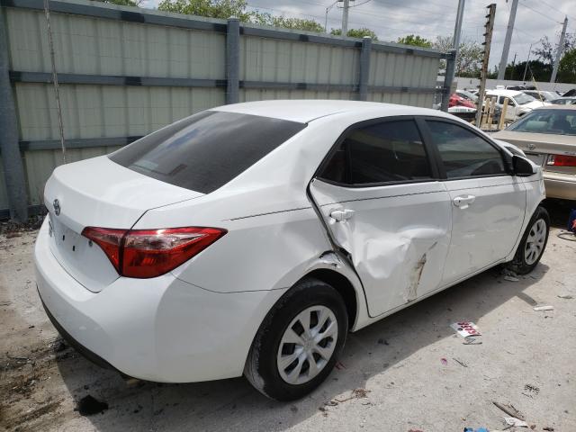 Photo 3 VIN: 5YFBURHEXKP858649 - TOYOTA COROLLA L 