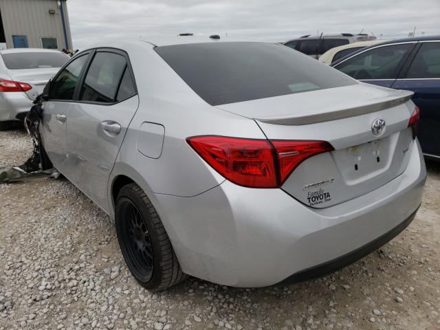 Photo 2 VIN: 5YFBURHEXKP867402 - TOYOTA COROLLA L 