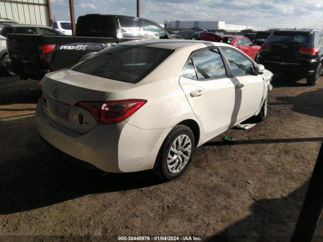 Photo 3 VIN: 5YFBURHEXKP870302 - TOYOTA COROLLA 