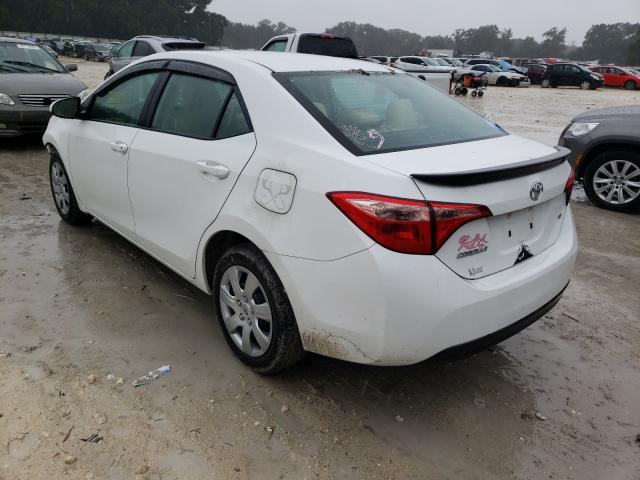 Photo 2 VIN: 5YFBURHEXKP878402 - TOYOTA COROLLA L 