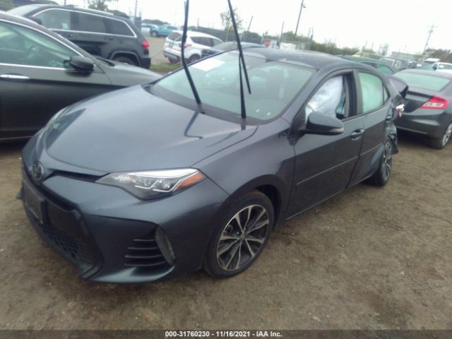 Photo 1 VIN: 5YFBURHEXKP878478 - TOYOTA COROLLA 