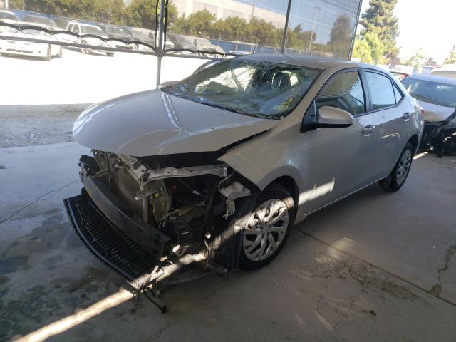 Photo 1 VIN: 5YFBURHEXKP885298 - TOYOTA COROLLA L 