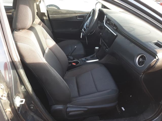 Photo 4 VIN: 5YFBURHEXKP887018 - TOYOTA COROLLA L 