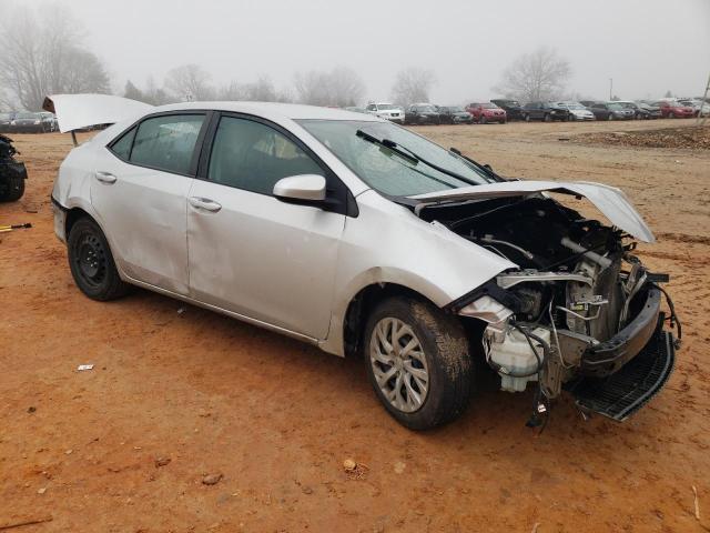 Photo 3 VIN: 5YFBURHEXKP888024 - TOYOTA COROLLA L 