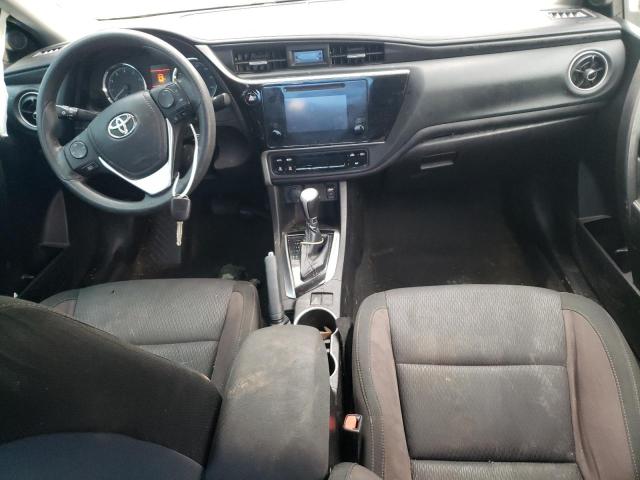 Photo 7 VIN: 5YFBURHEXKP888024 - TOYOTA COROLLA L 