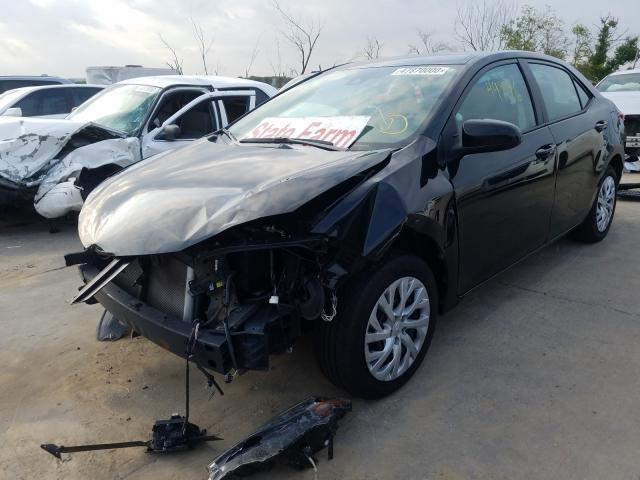 Photo 1 VIN: 5YFBURHEXKP894938 - TOYOTA COROLLA L 