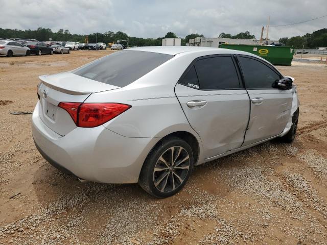 Photo 2 VIN: 5YFBURHEXKP900107 - TOYOTA COROLLA L 