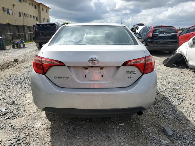 Photo 5 VIN: 5YFBURHEXKP906487 - TOYOTA COROLLA L 