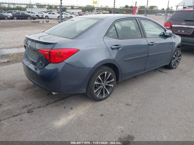 Photo 3 VIN: 5YFBURHEXKP915920 - TOYOTA COROLLA 