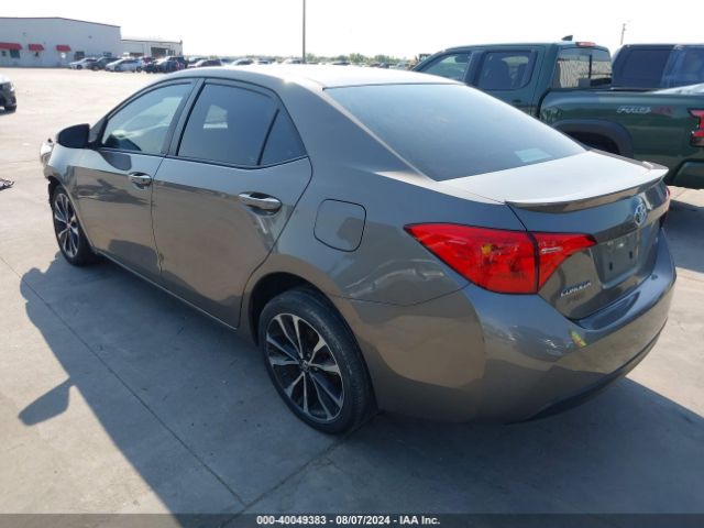 Photo 2 VIN: 5YFBURHEXKP916680 - TOYOTA COROLLA 