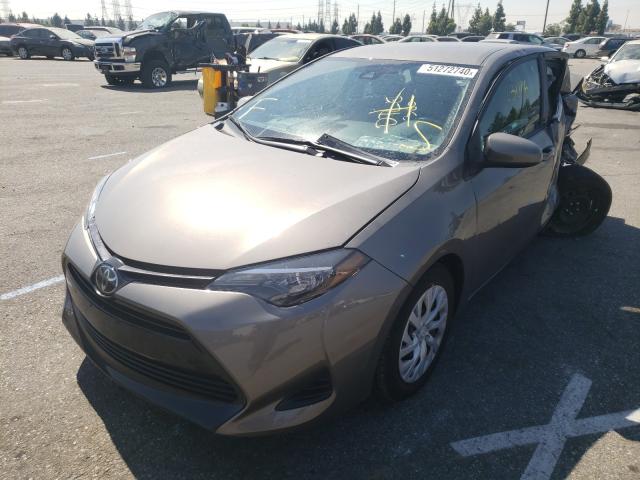 Photo 1 VIN: 5YFBURHEXKP916985 - TOYOTA COROLLA L 