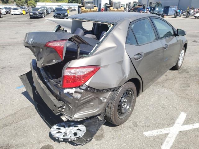 Photo 3 VIN: 5YFBURHEXKP916985 - TOYOTA COROLLA L 