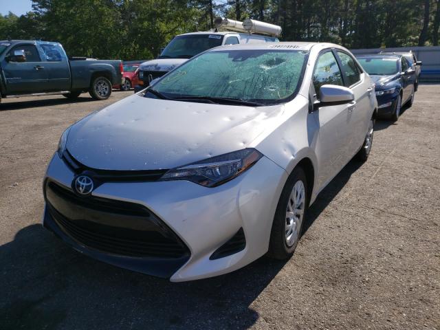 Photo 1 VIN: 5YFBURHEXKP920129 - TOYOTA COROLLA L 