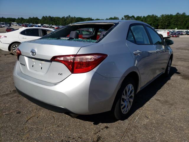 Photo 3 VIN: 5YFBURHEXKP920129 - TOYOTA COROLLA L 