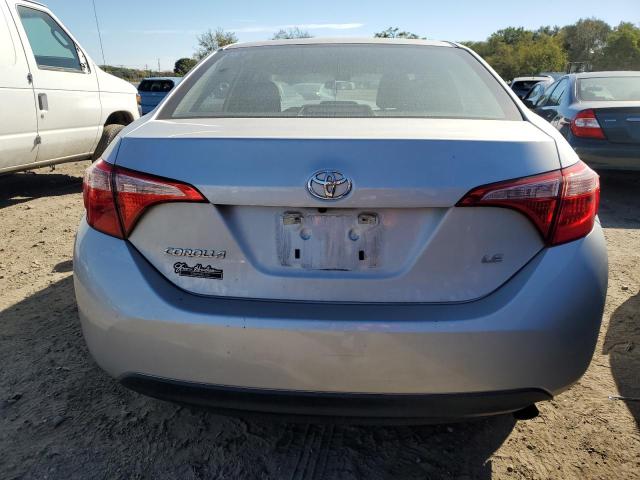 Photo 5 VIN: 5YFBURHEXKP938324 - TOYOTA COROLLA L 