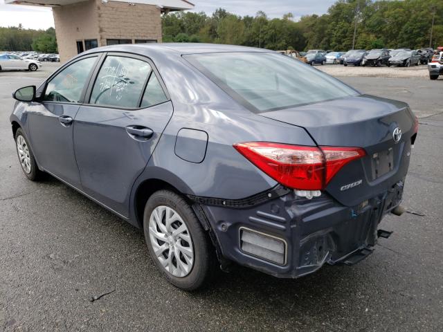 Photo 2 VIN: 5YFBURHEXKP940817 - TOYOTA COROLLA L 