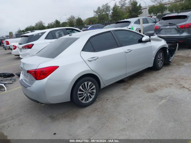 Photo 3 VIN: 5YFBURHEXKP943538 - TOYOTA COROLLA 