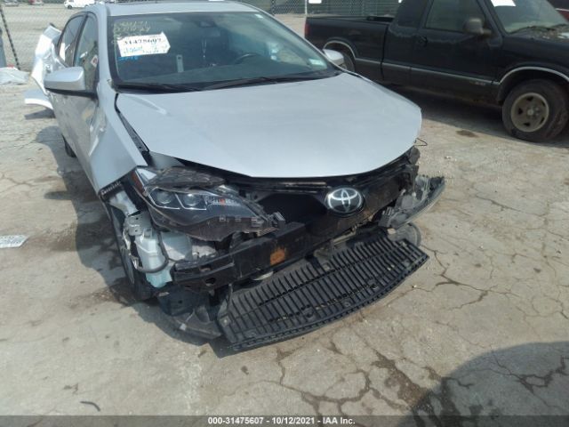 Photo 5 VIN: 5YFBURHEXKP946794 - TOYOTA COROLLA 