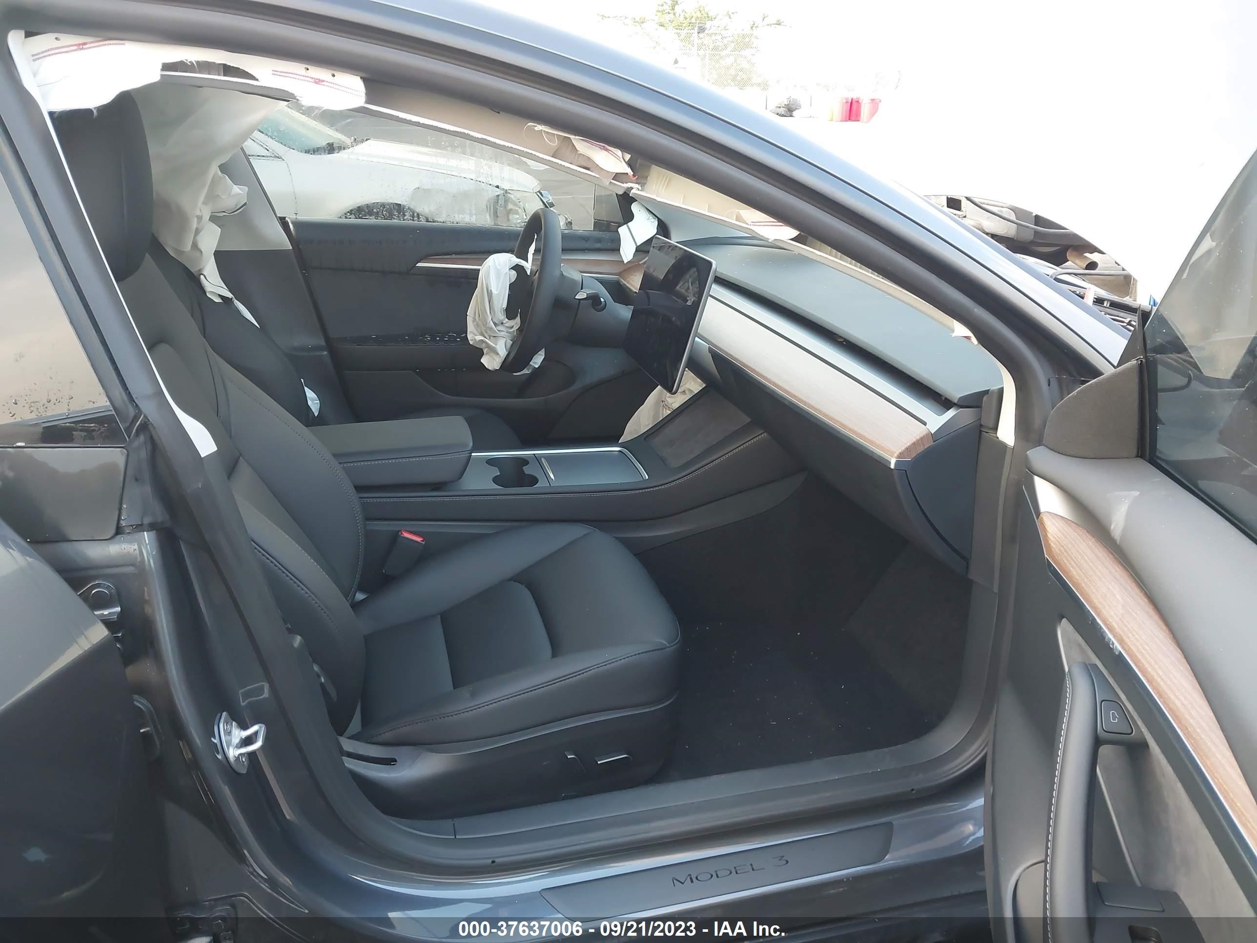 Photo 4 VIN: 5YJ3E1EA1PF644494 - TESLA MODEL 3 