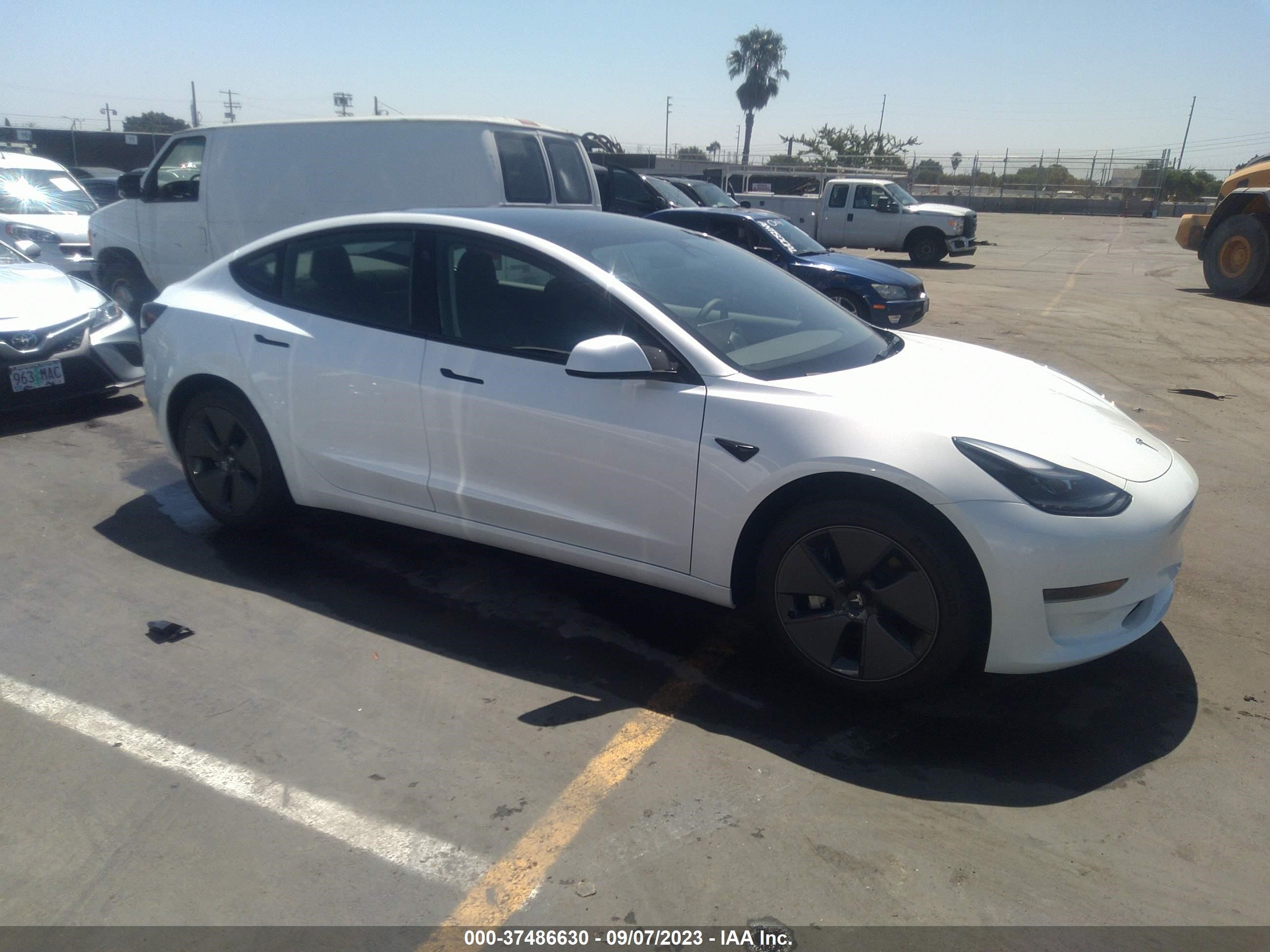 Photo 0 VIN: 5YJ3E1EA2PF571877 - TESLA MODEL 3 