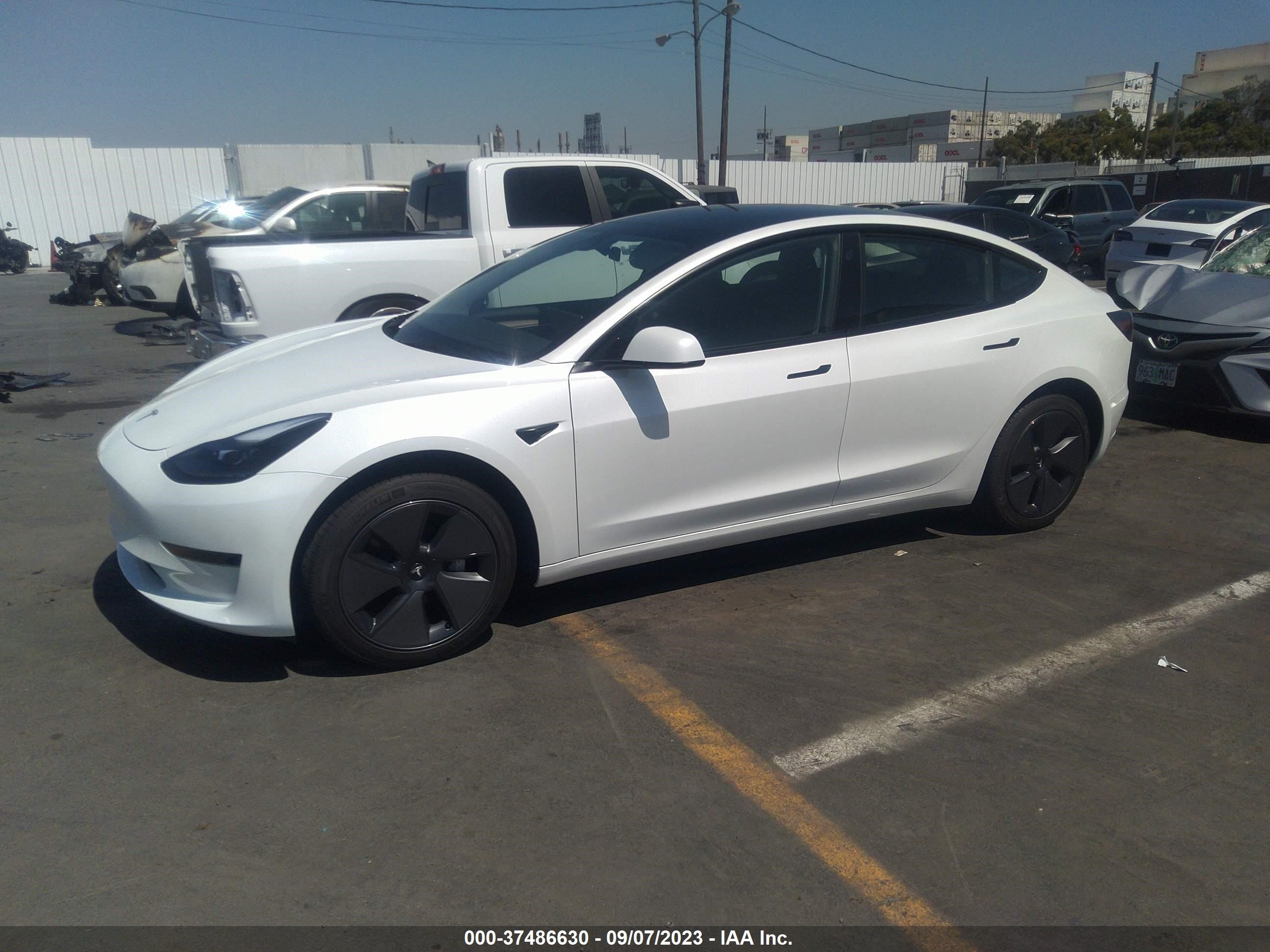 Photo 1 VIN: 5YJ3E1EA2PF571877 - TESLA MODEL 3 