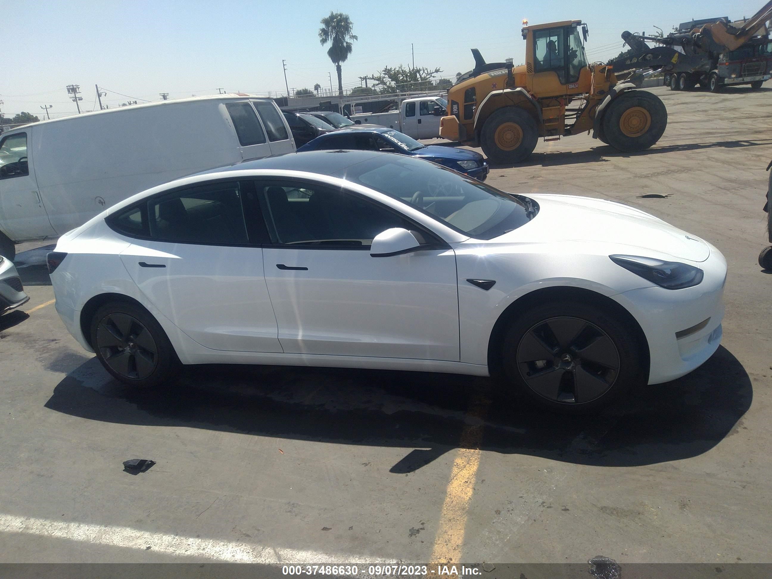 Photo 11 VIN: 5YJ3E1EA2PF571877 - TESLA MODEL 3 