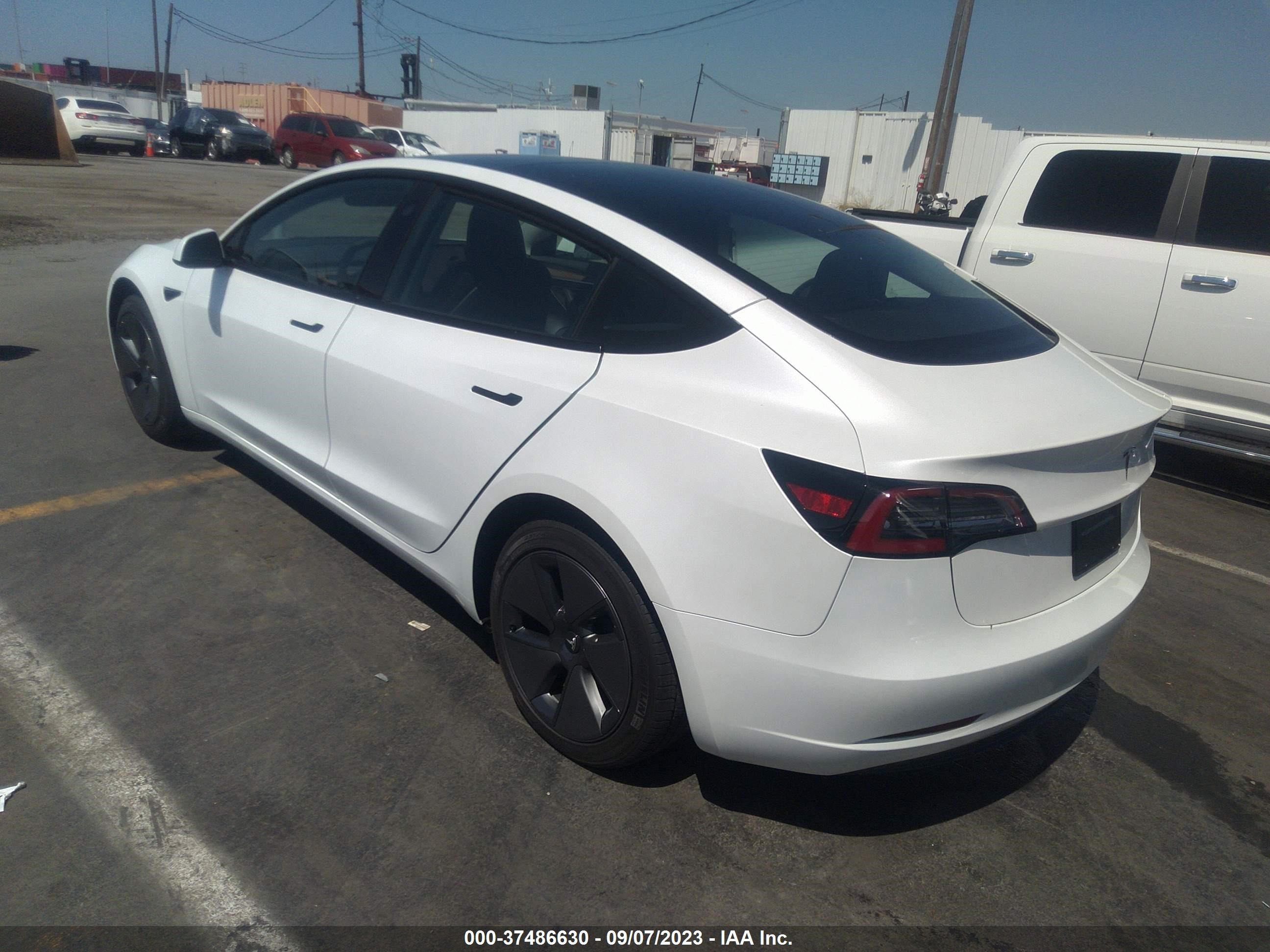 Photo 2 VIN: 5YJ3E1EA2PF571877 - TESLA MODEL 3 