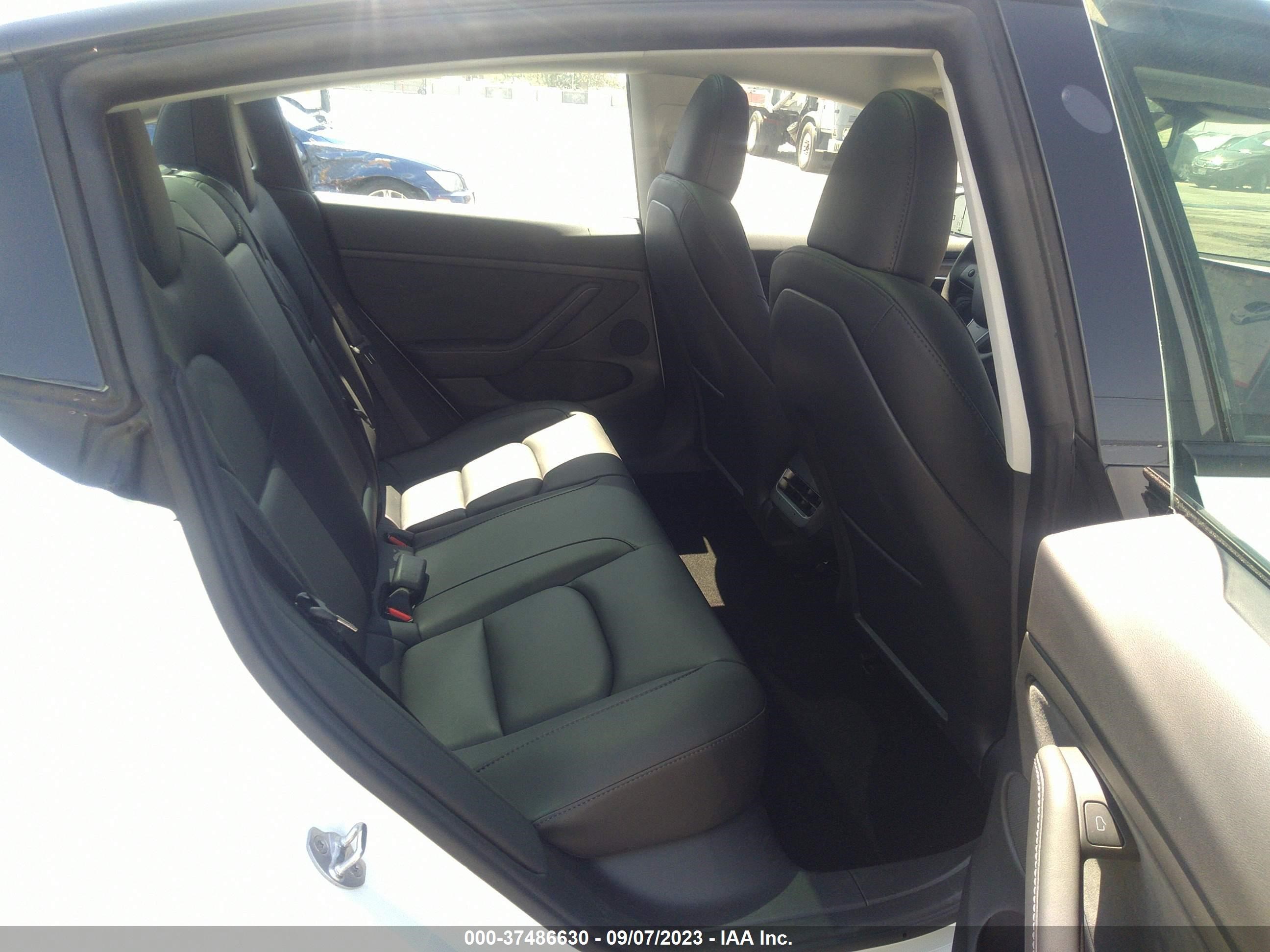 Photo 7 VIN: 5YJ3E1EA2PF571877 - TESLA MODEL 3 