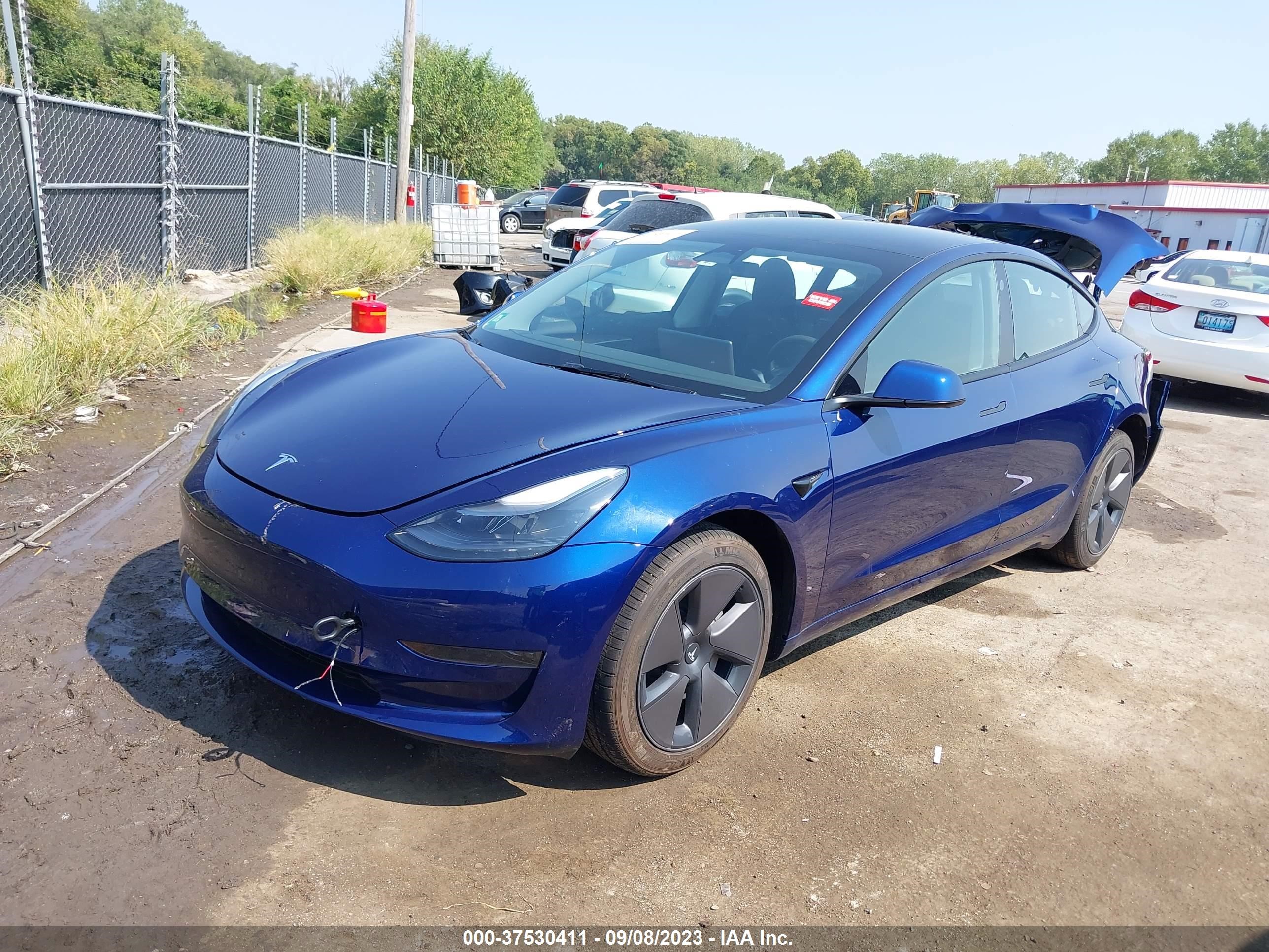 Photo 1 VIN: 5YJ3E1EA3PF605700 - TESLA MODEL 3 