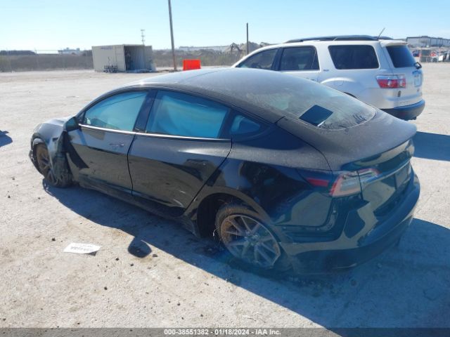 Photo 2 VIN: 5YJ3E1EA4PF697867 - TESLA MODEL 3 