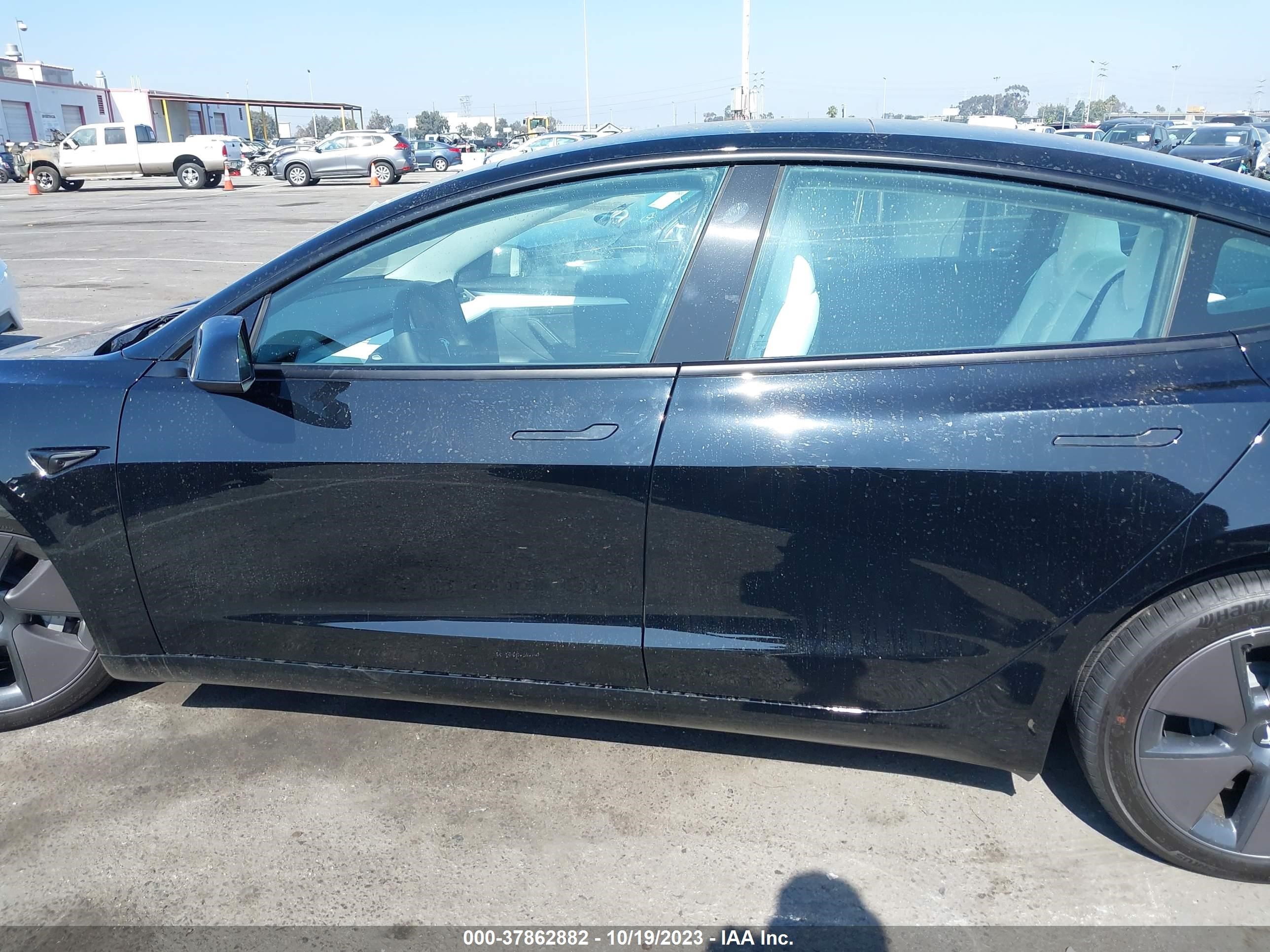 Photo 11 VIN: 5YJ3E1EA5PF619582 - TESLA MODEL 3 