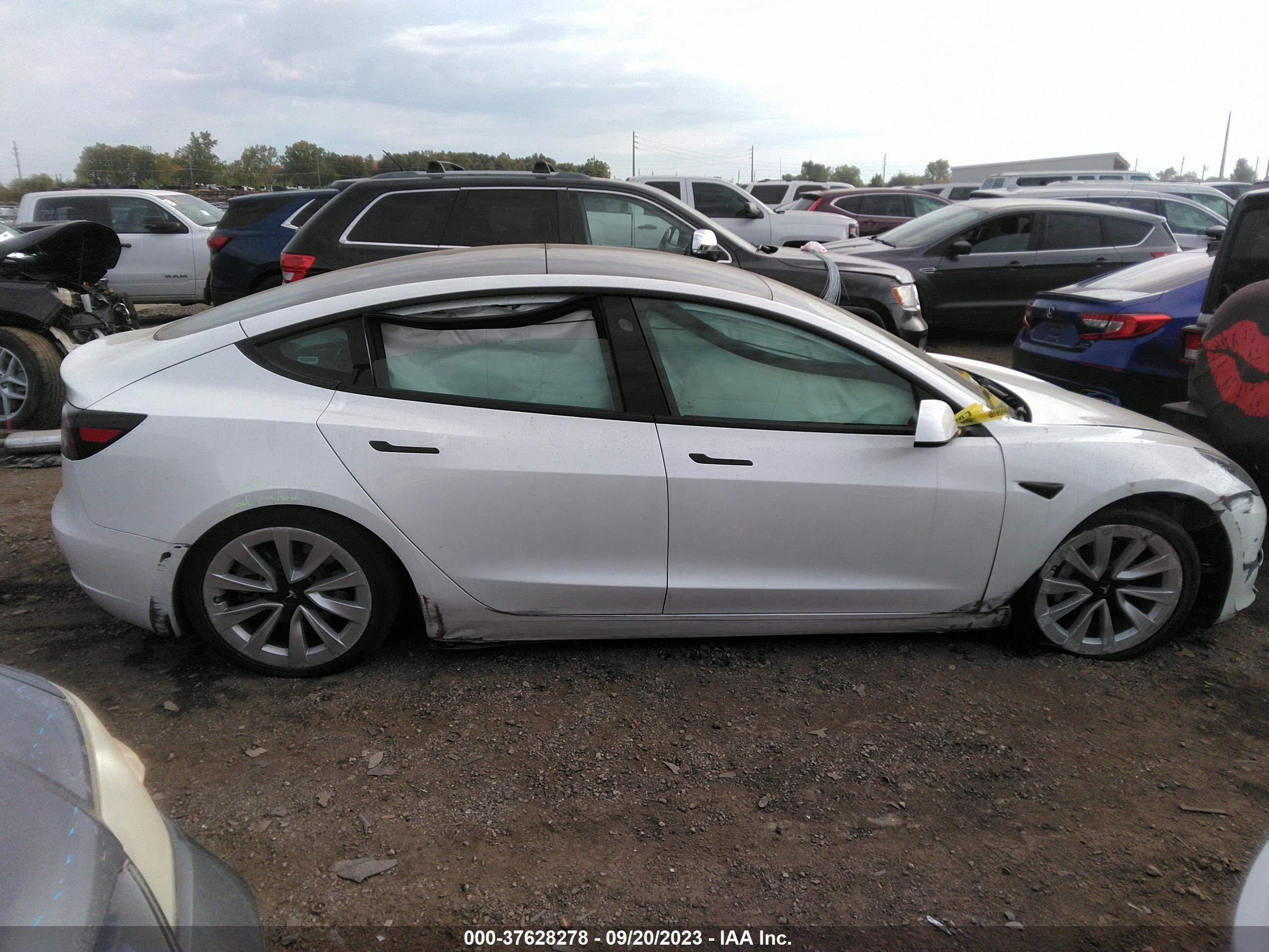 Photo 11 VIN: 5YJ3E1EA7PF426706 - TESLA MODEL 3 