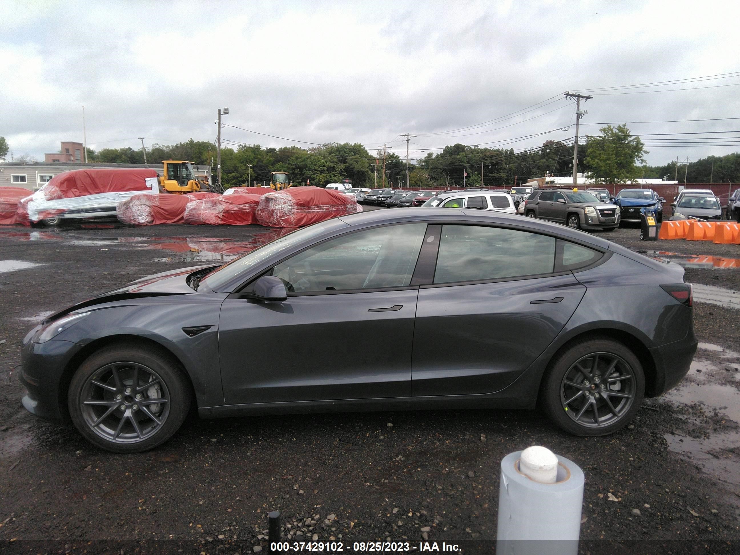 Photo 12 VIN: 5YJ3E1EA7PF555593 - TESLA MODEL 3 