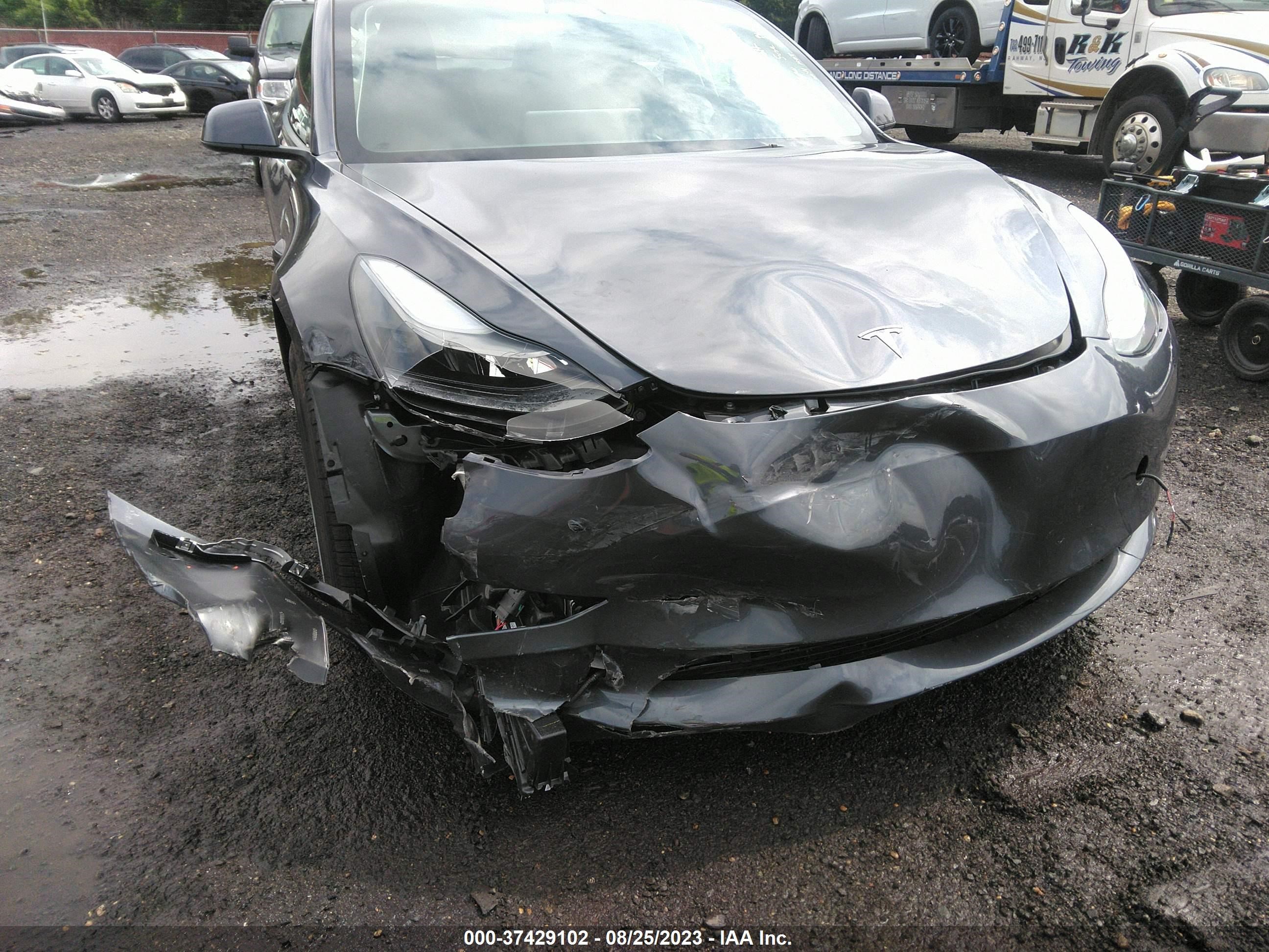 Photo 5 VIN: 5YJ3E1EA7PF555593 - TESLA MODEL 3 