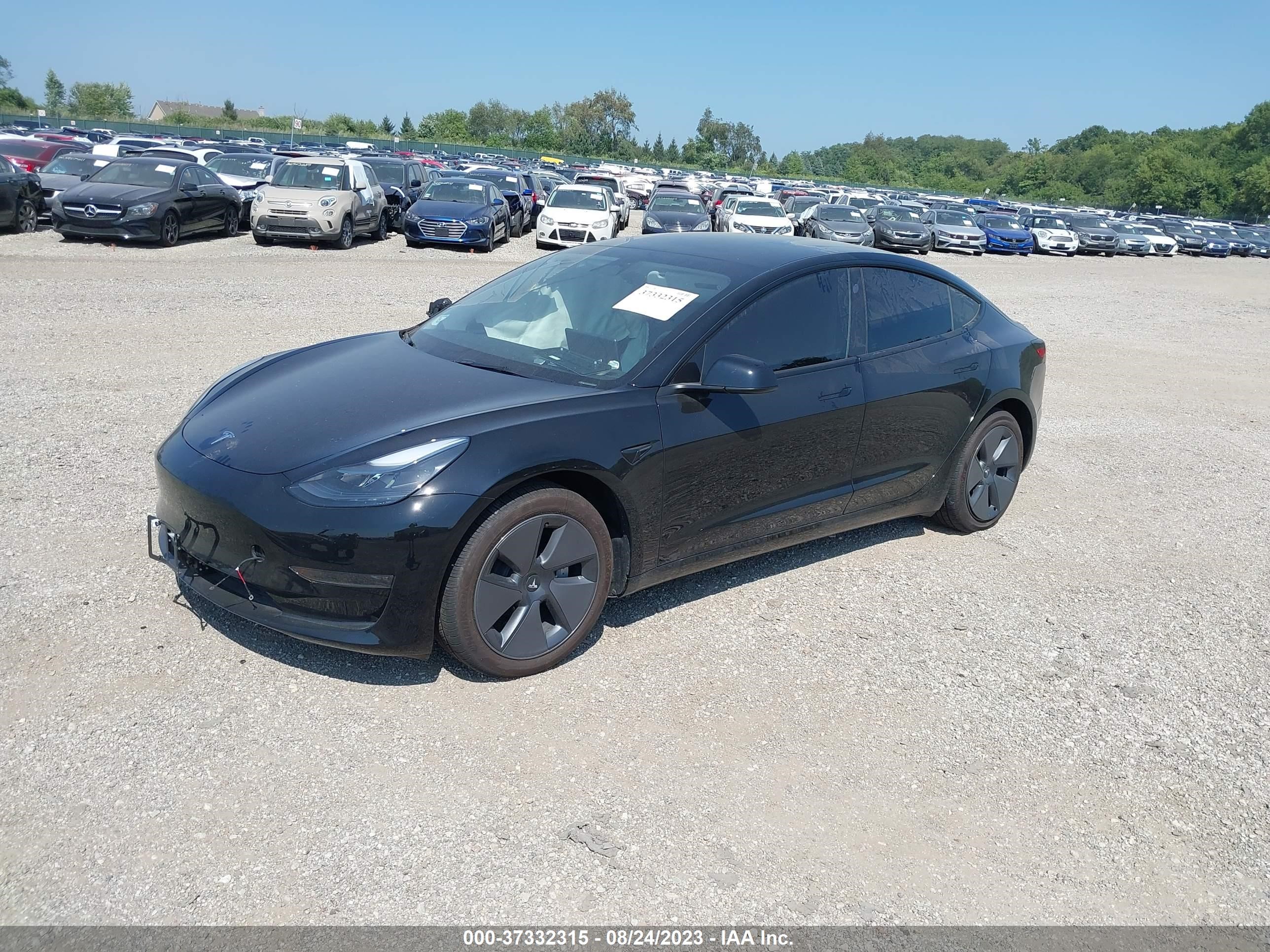 Photo 1 VIN: 5YJ3E1EAXPF512818 - TESLA MODEL 3 