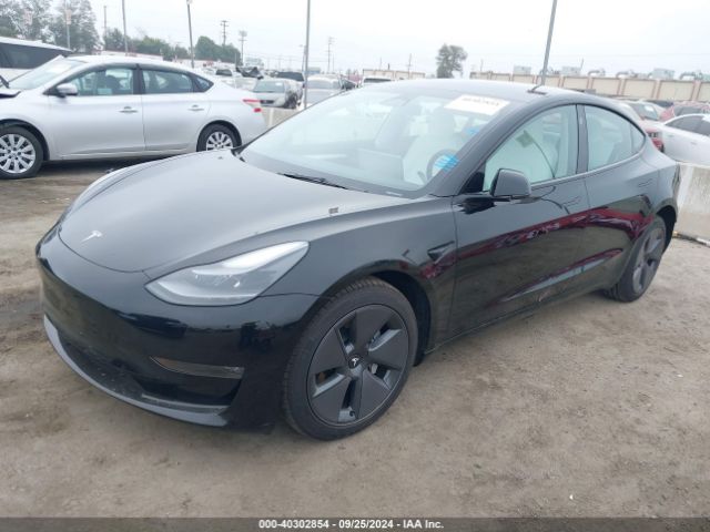 Photo 1 VIN: 5YJ3E1EB2PF389895 - TESLA MODEL 3 