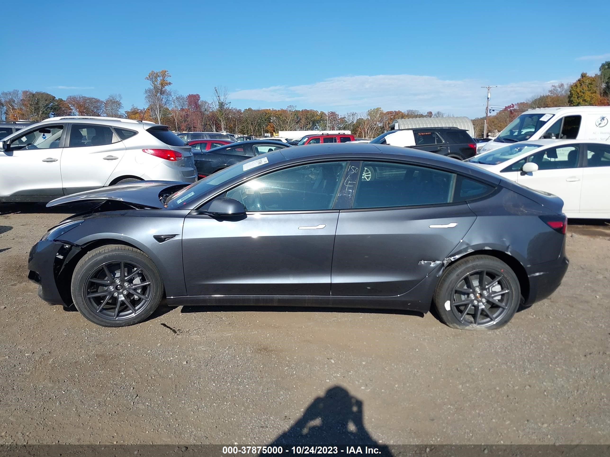 Photo 11 VIN: 5YJ3E1EB2PF662771 - TESLA MODEL 3 