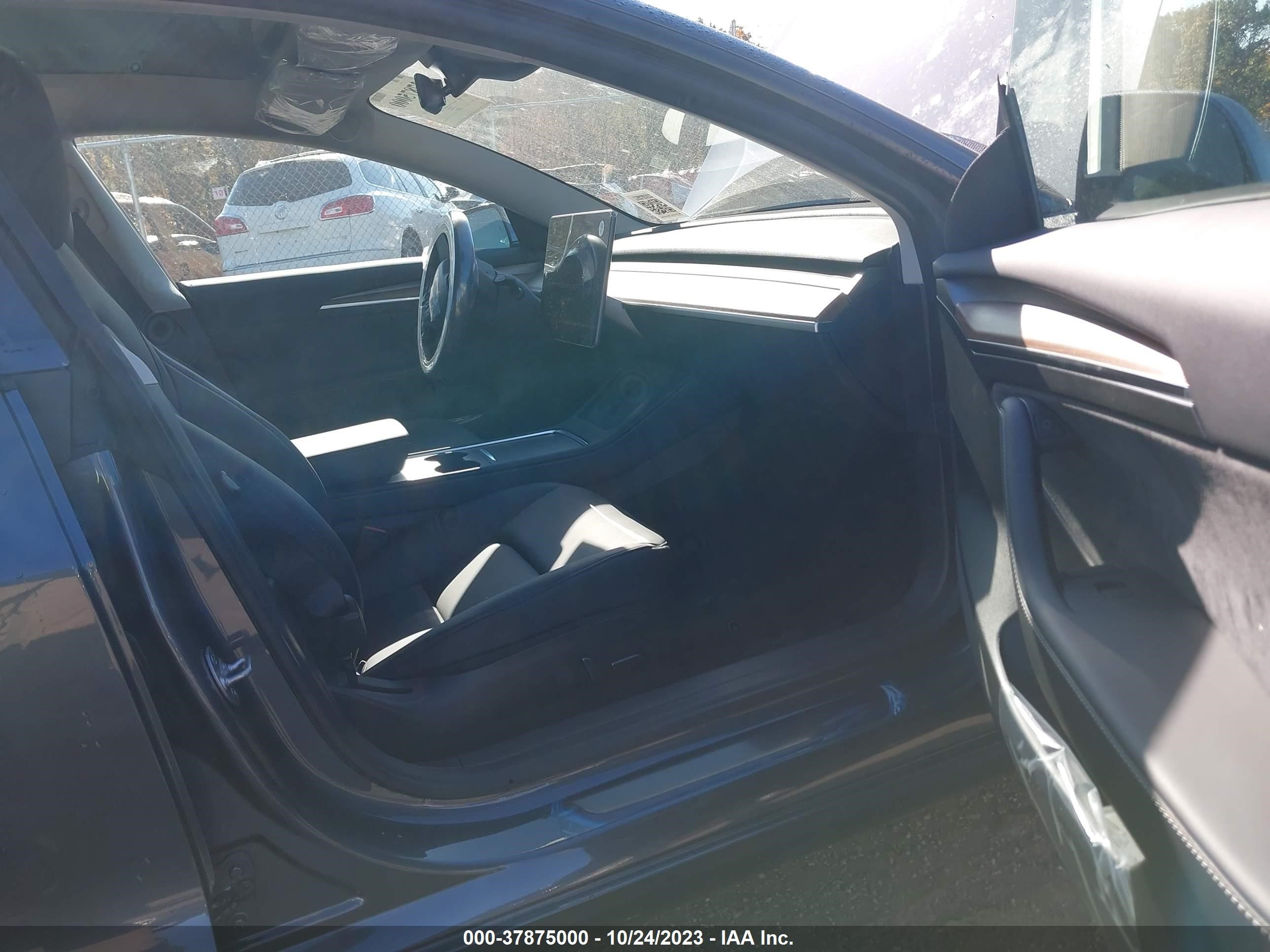 Photo 4 VIN: 5YJ3E1EB2PF662771 - TESLA MODEL 3 