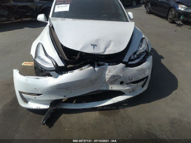 Photo 5 VIN: 5YJ3E1EB4JF084339 - TESLA MODEL 3 