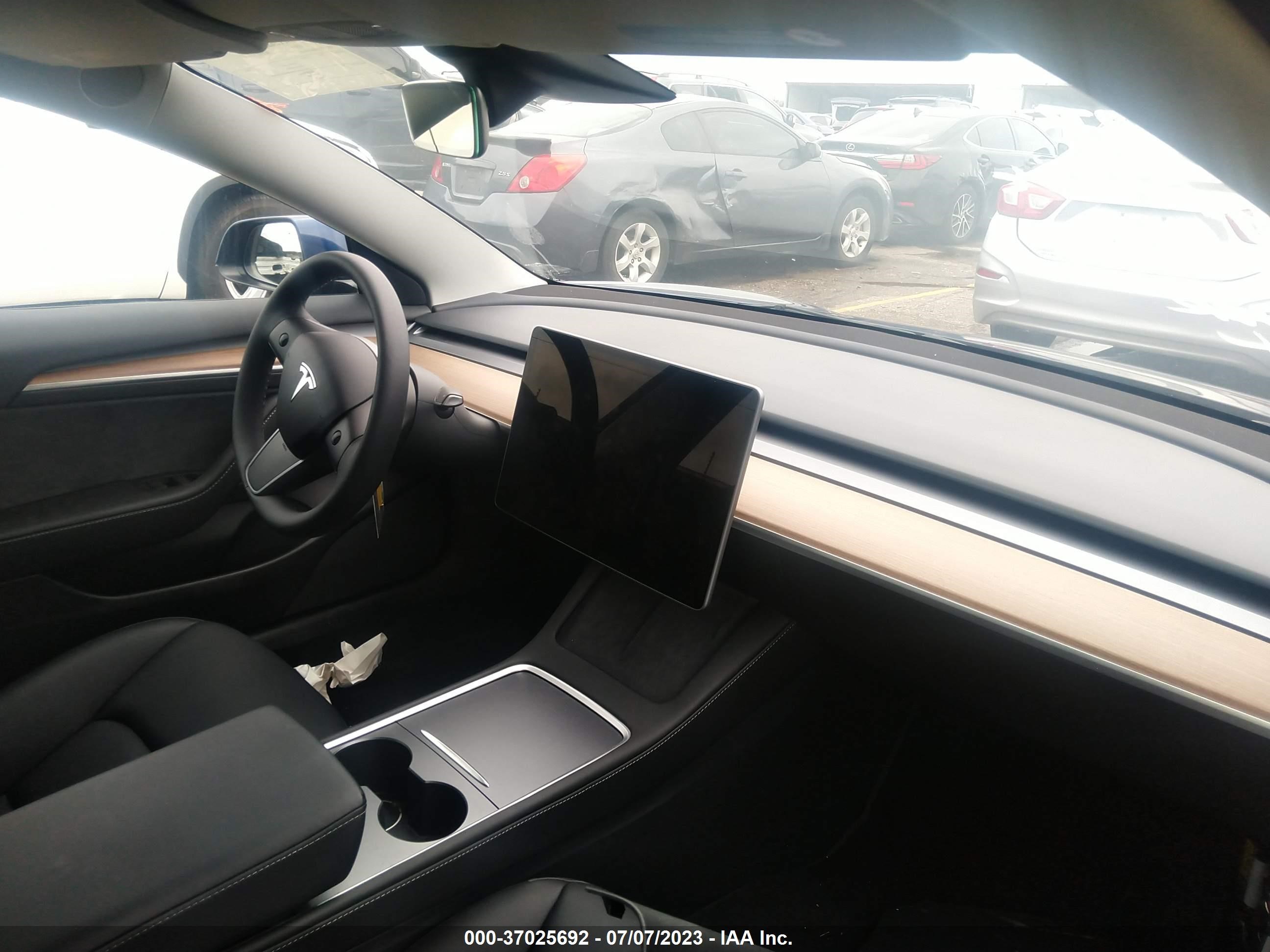 Photo 4 VIN: 5YJ3E1EB4PF391387 - TESLA MODEL 3 