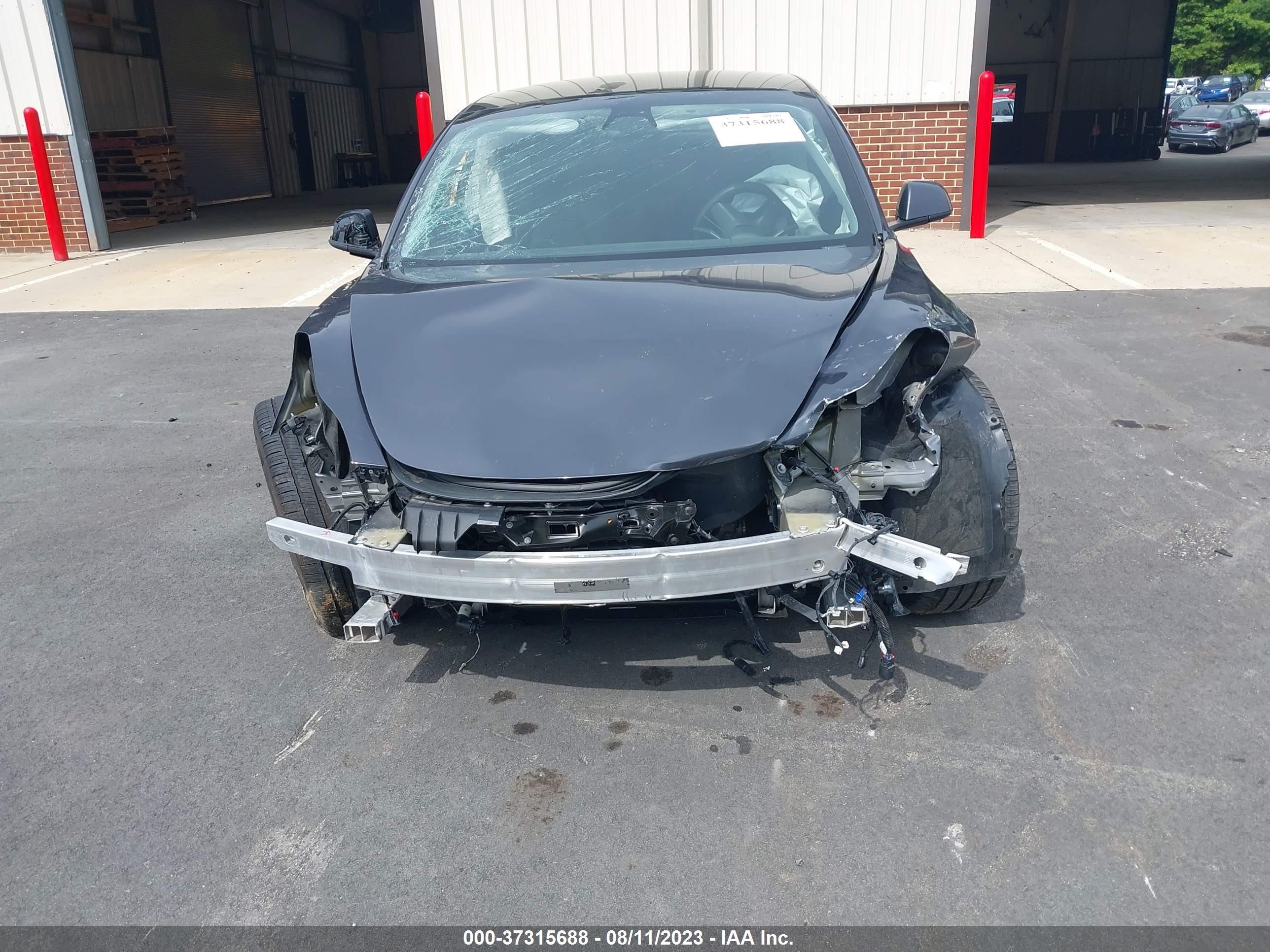 Photo 5 VIN: 5YJ3E1EB7MF988092 - TESLA MODEL 3 