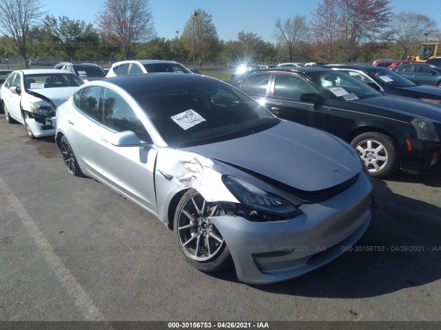 Photo 5 VIN: 5YJ3E1EBXJF054455 - TESLA MODEL 3 