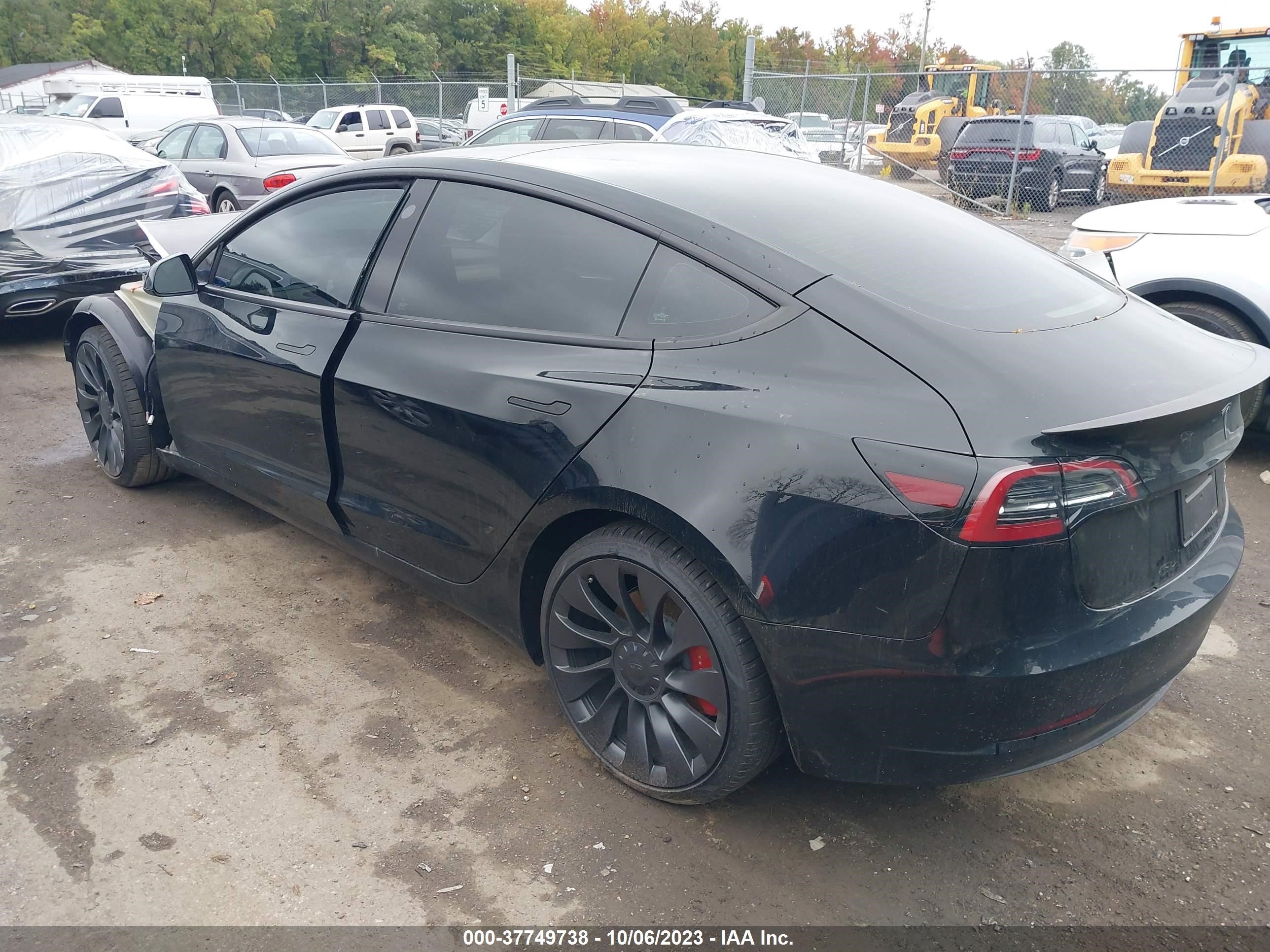 Photo 2 VIN: 5YJ3E1EC3PF488881 - TESLA MODEL 3 