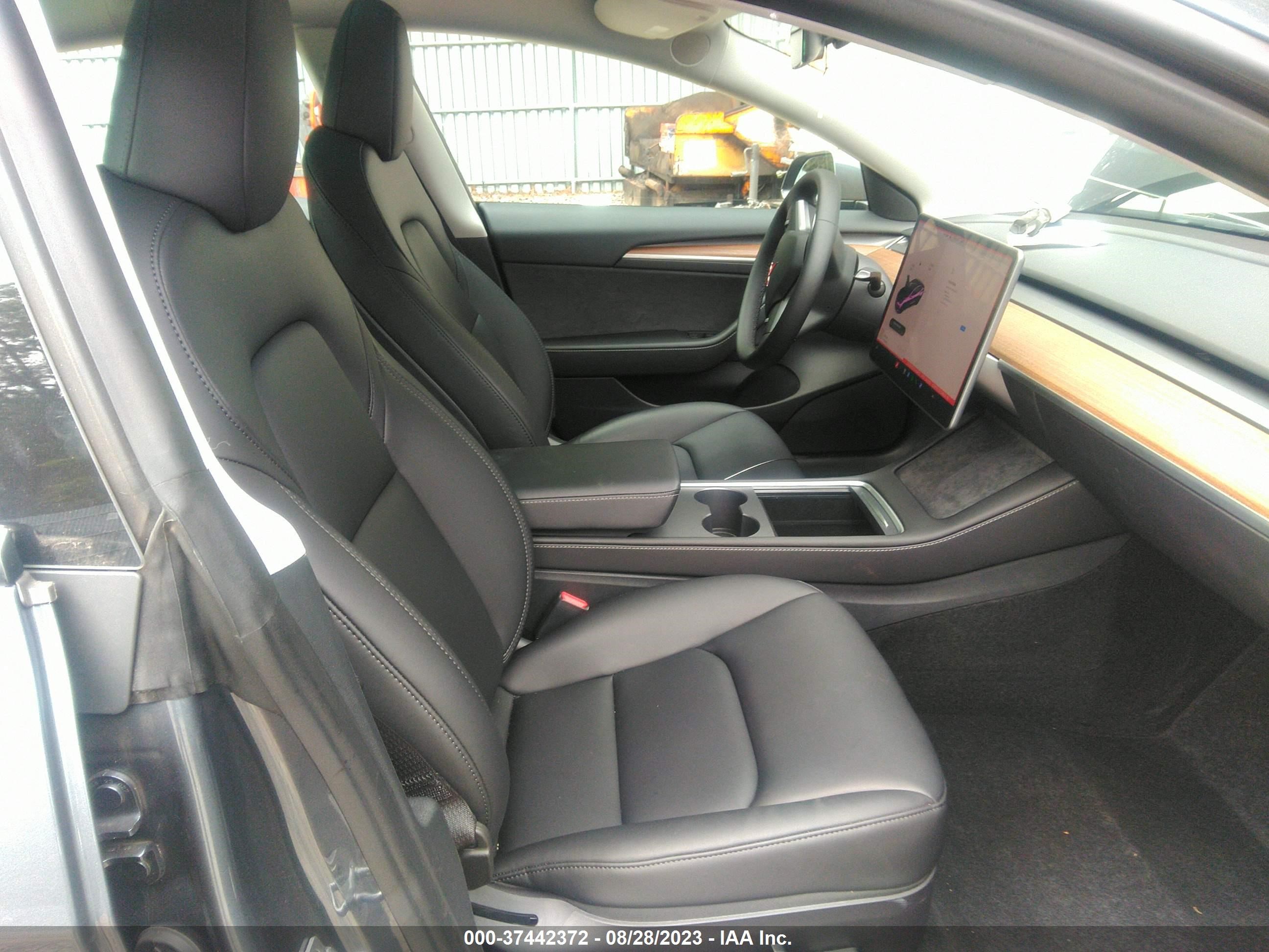 Photo 4 VIN: 5YJ3E1EC5PF494133 - TESLA MODEL 3 