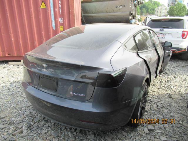 Photo 2 VIN: 5YJ3E1EC5PF703869 - TESLA MODEL 3 