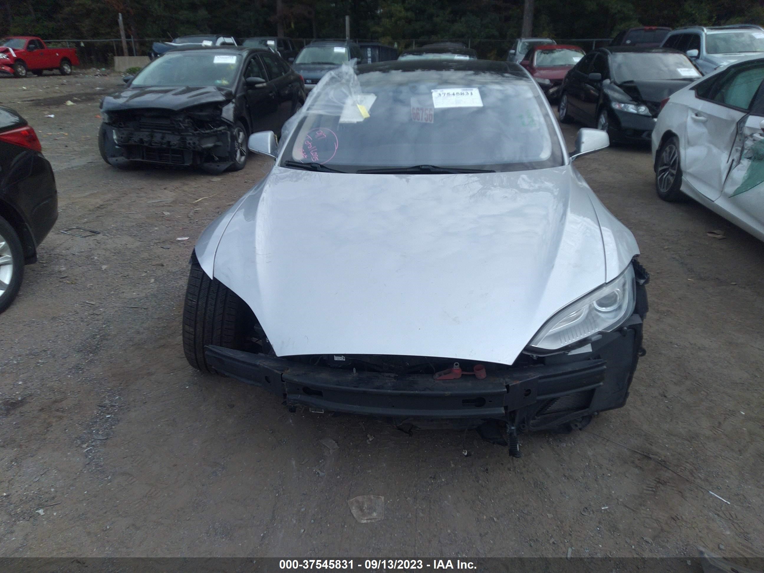 Photo 11 VIN: 5YJSA1H22EFP62398 - TESLA MODEL S 