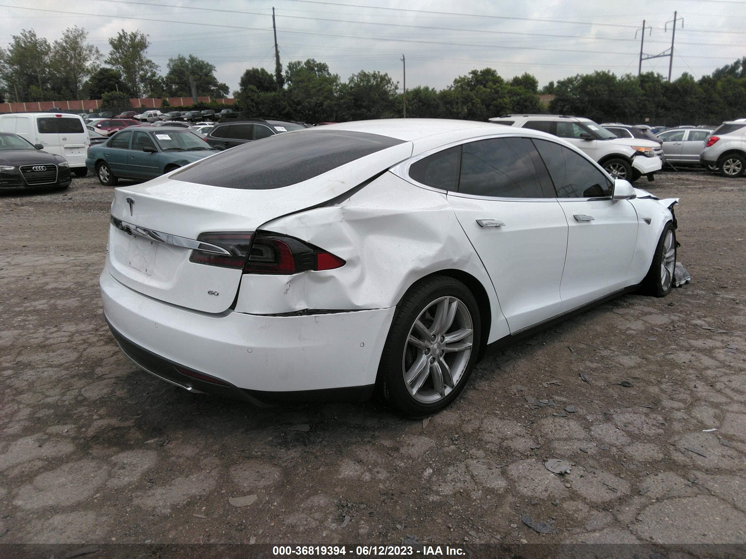 Photo 3 VIN: 5YJSA1S11FFP77010 - TESLA MODEL S 