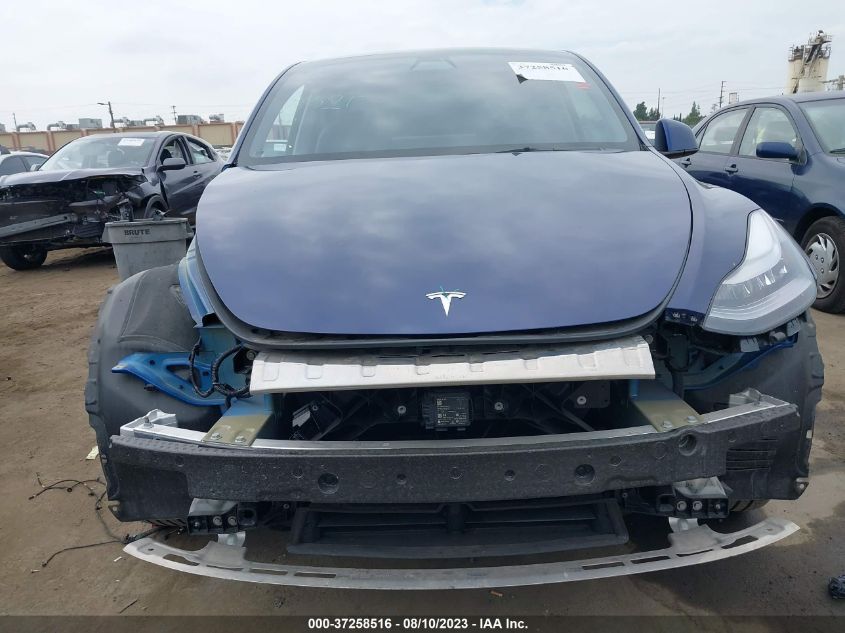 Photo 11 VIN: 5YJYGDEEXMF173204 - TESLA MODEL Y 